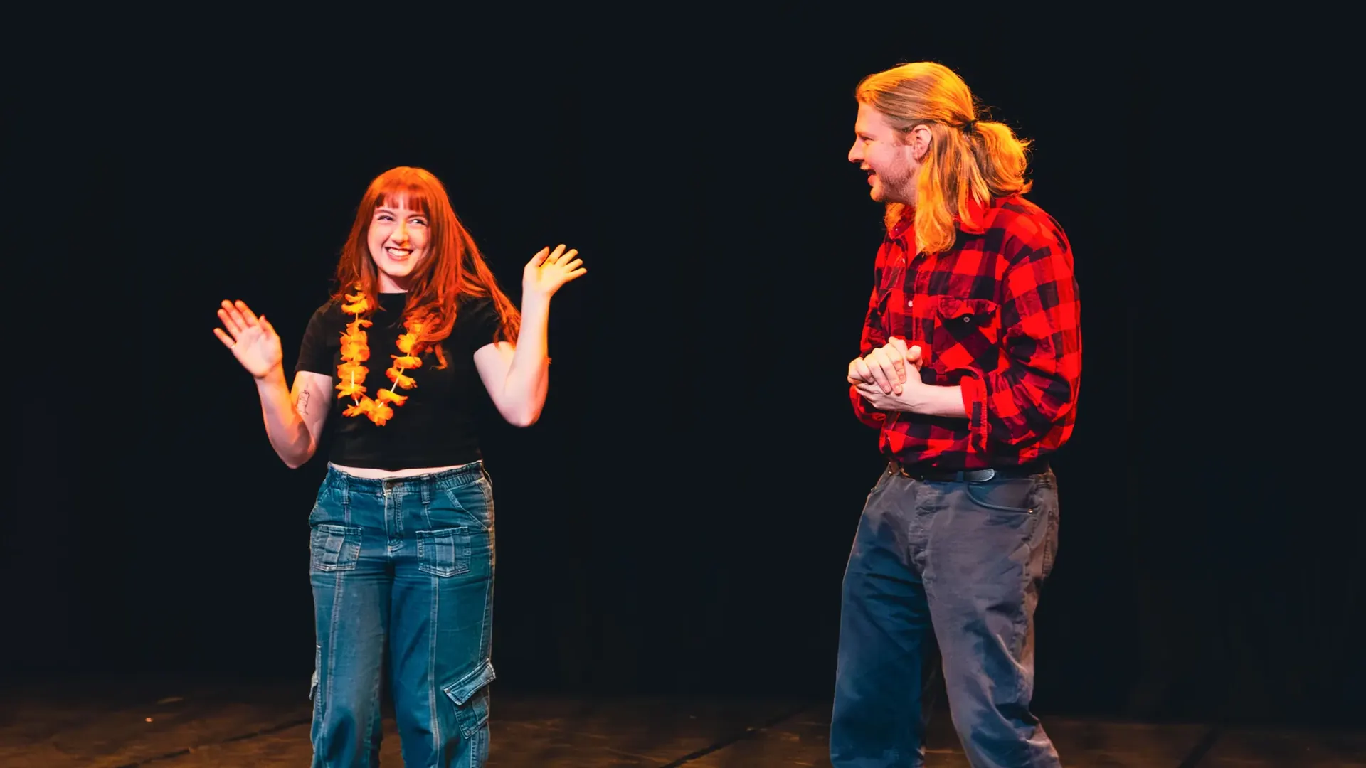 Two performers on stage in 30 Day Free Trial
