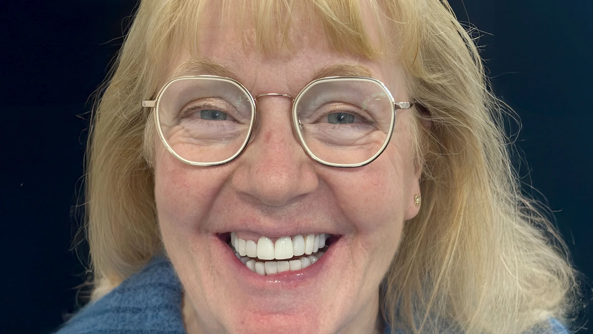 Patient smiling for a Genix Healthcare success story