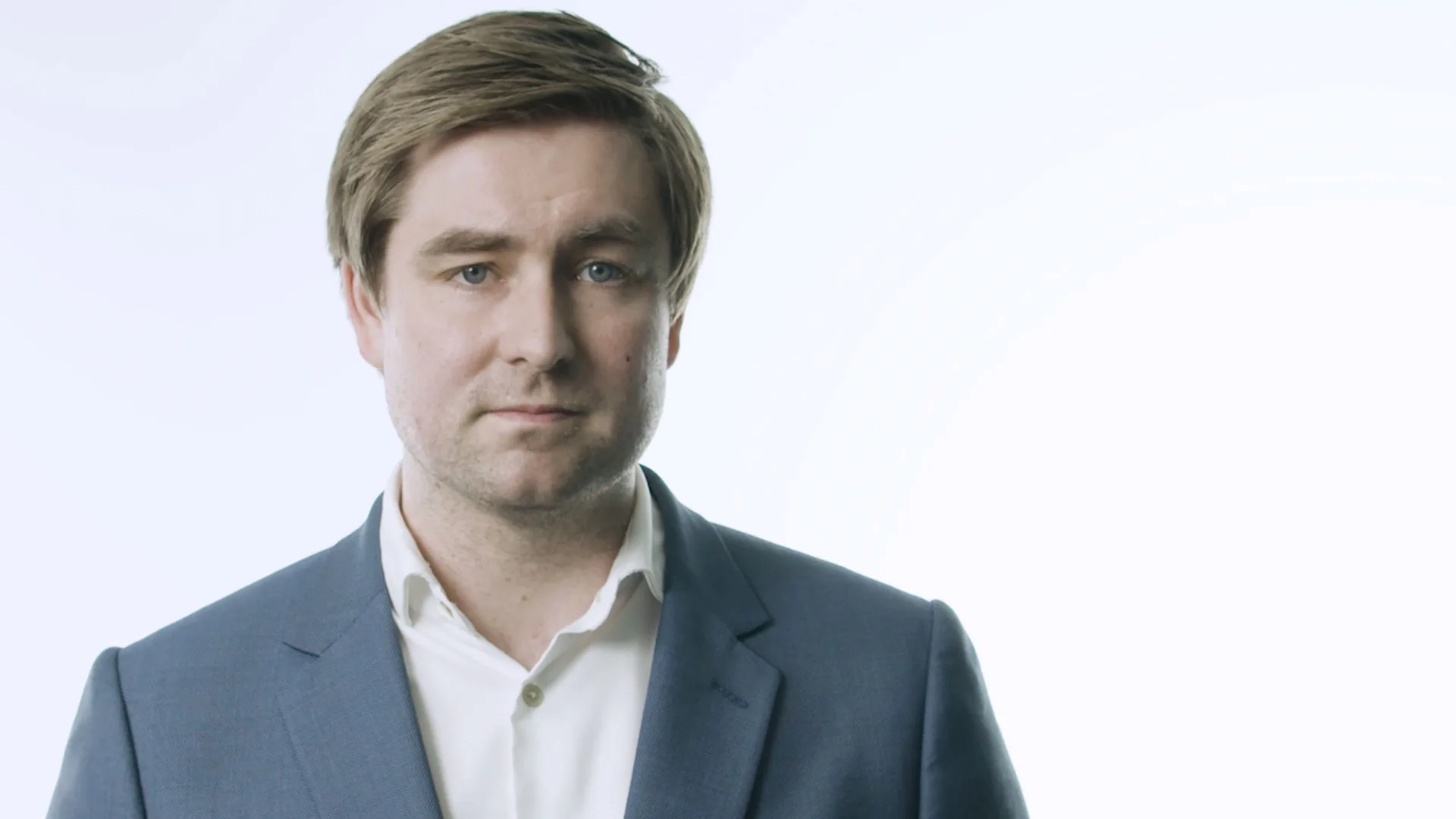 Progeny presenter portrait against a light background