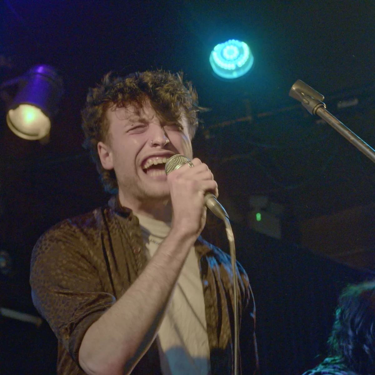Singer performing at Battle of the Bands