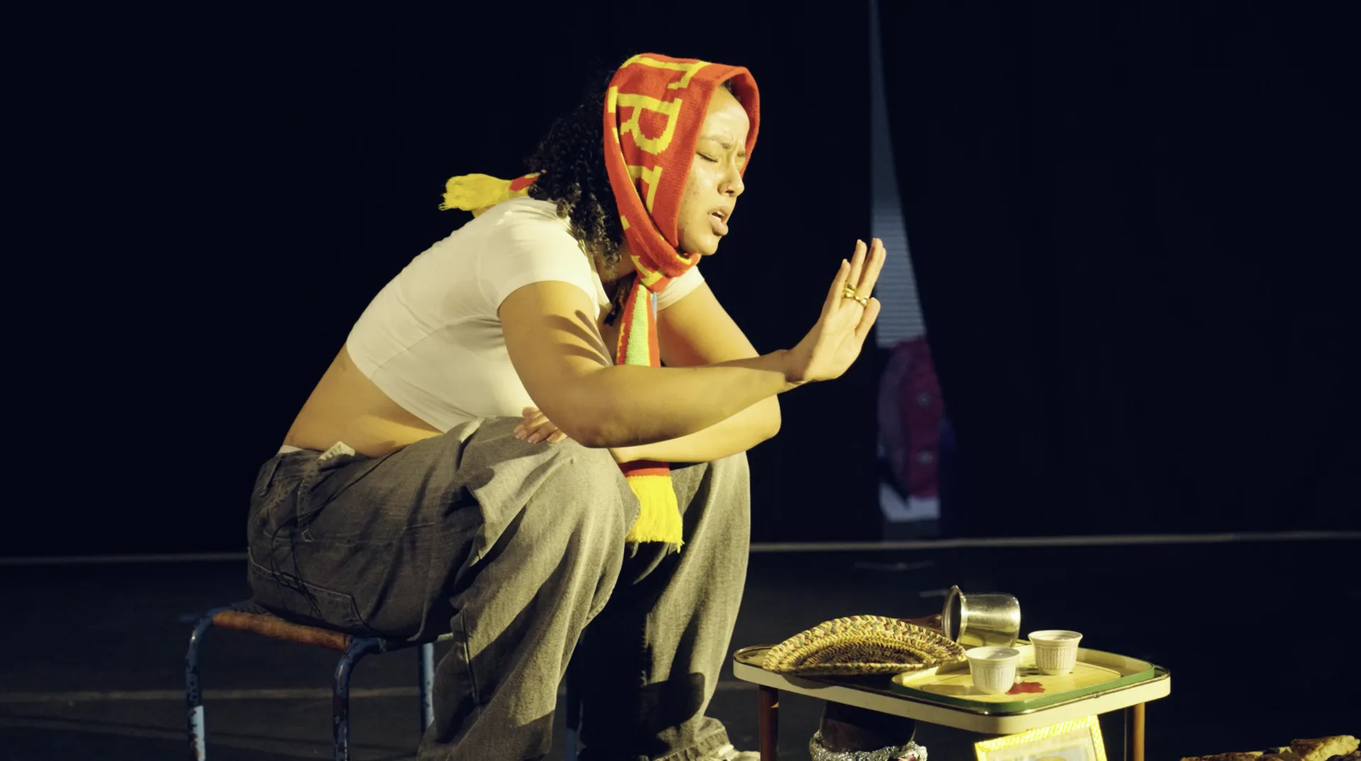 Costumed performance moment from Adey