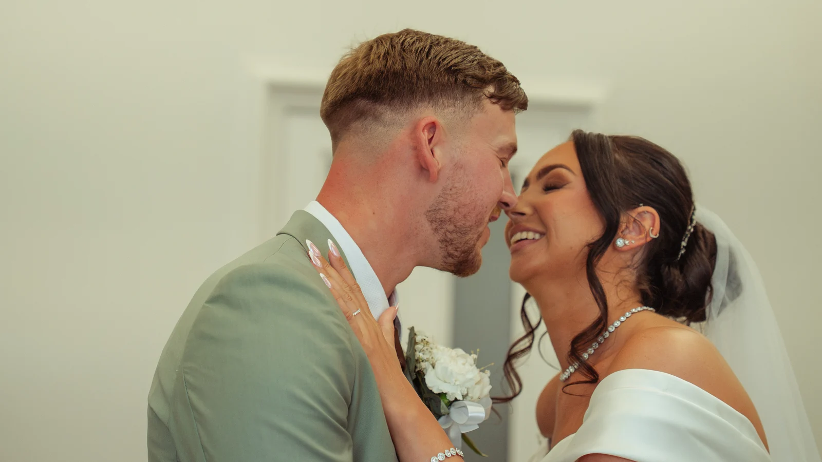 Newlyweds sharing a close portrait at the Ferguson and Howes wedding
