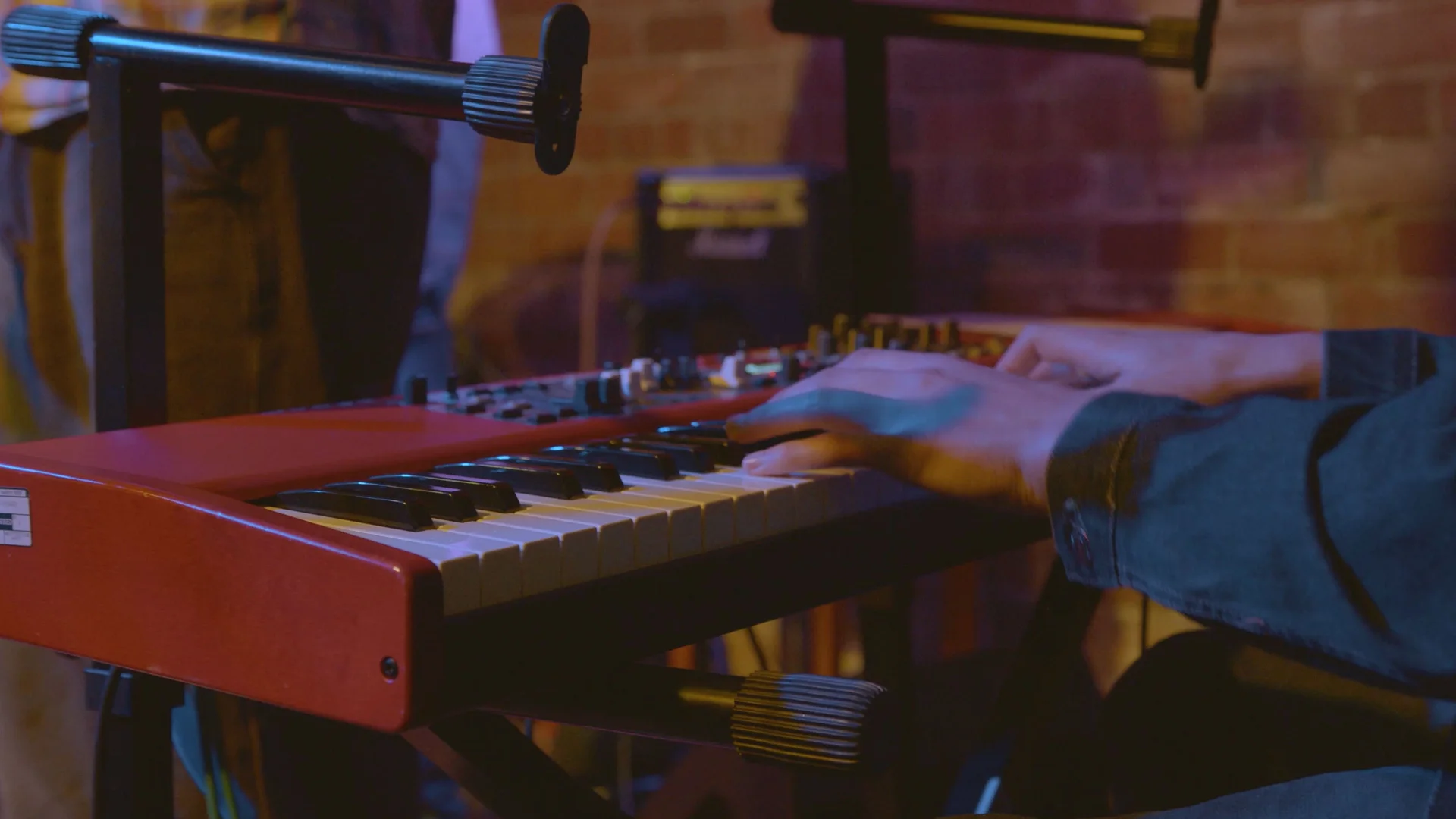 Keyboard player performing at The Showcase