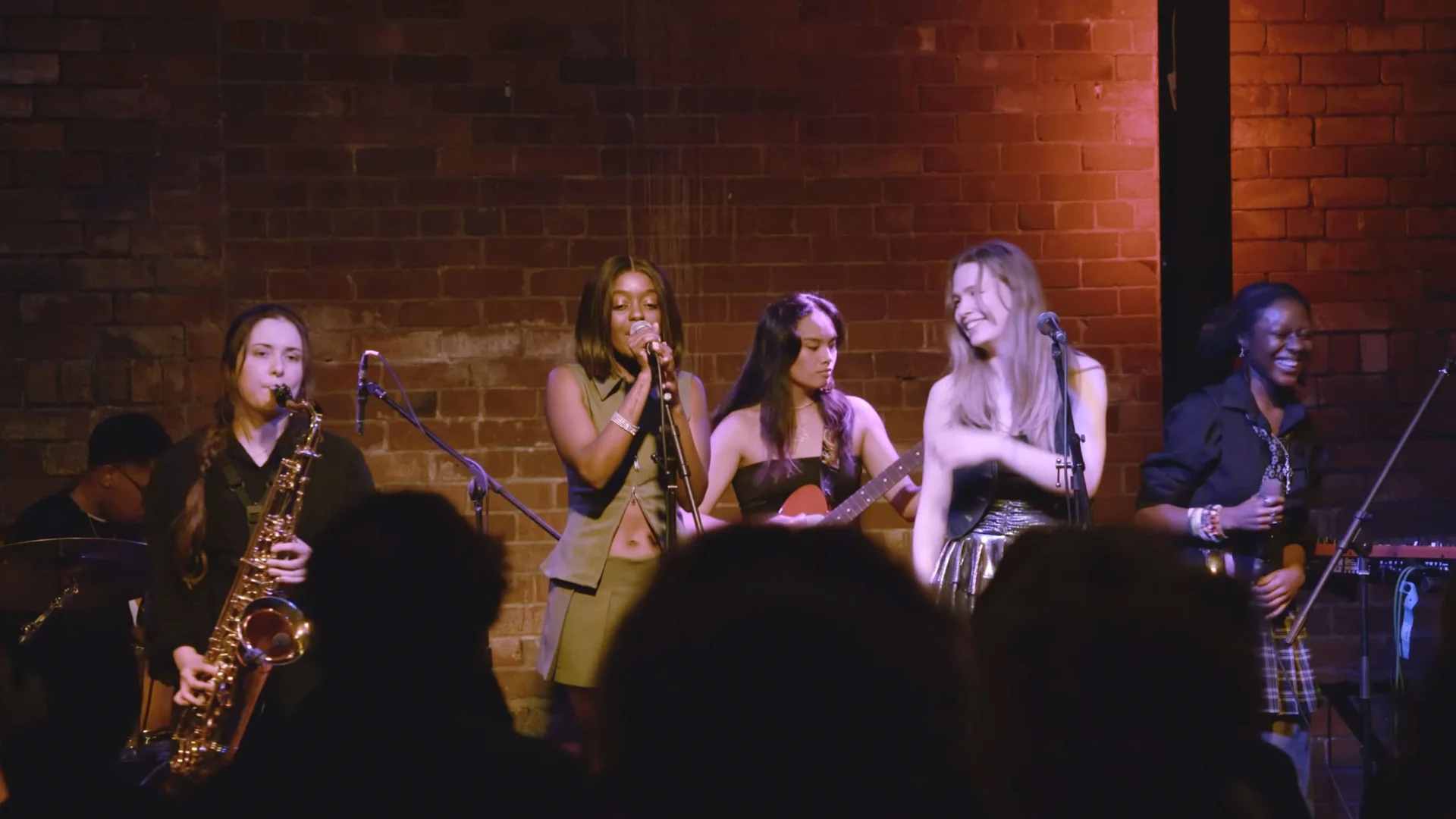 Performers gathered together on stage at The Showcase