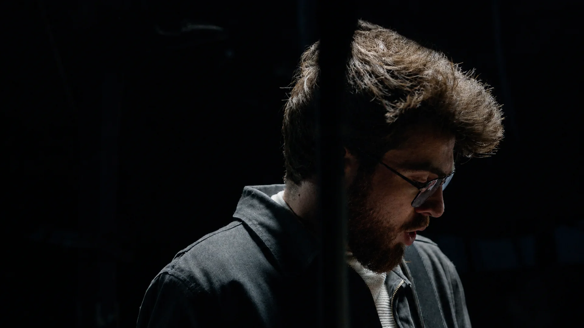 Low-key portrait from the I See Red music video