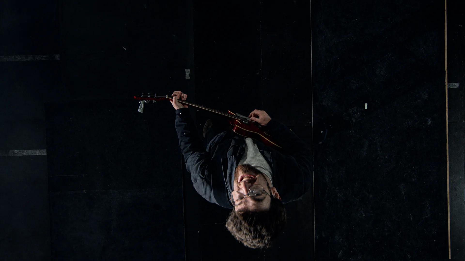 Upside-down performance shot from I See Red