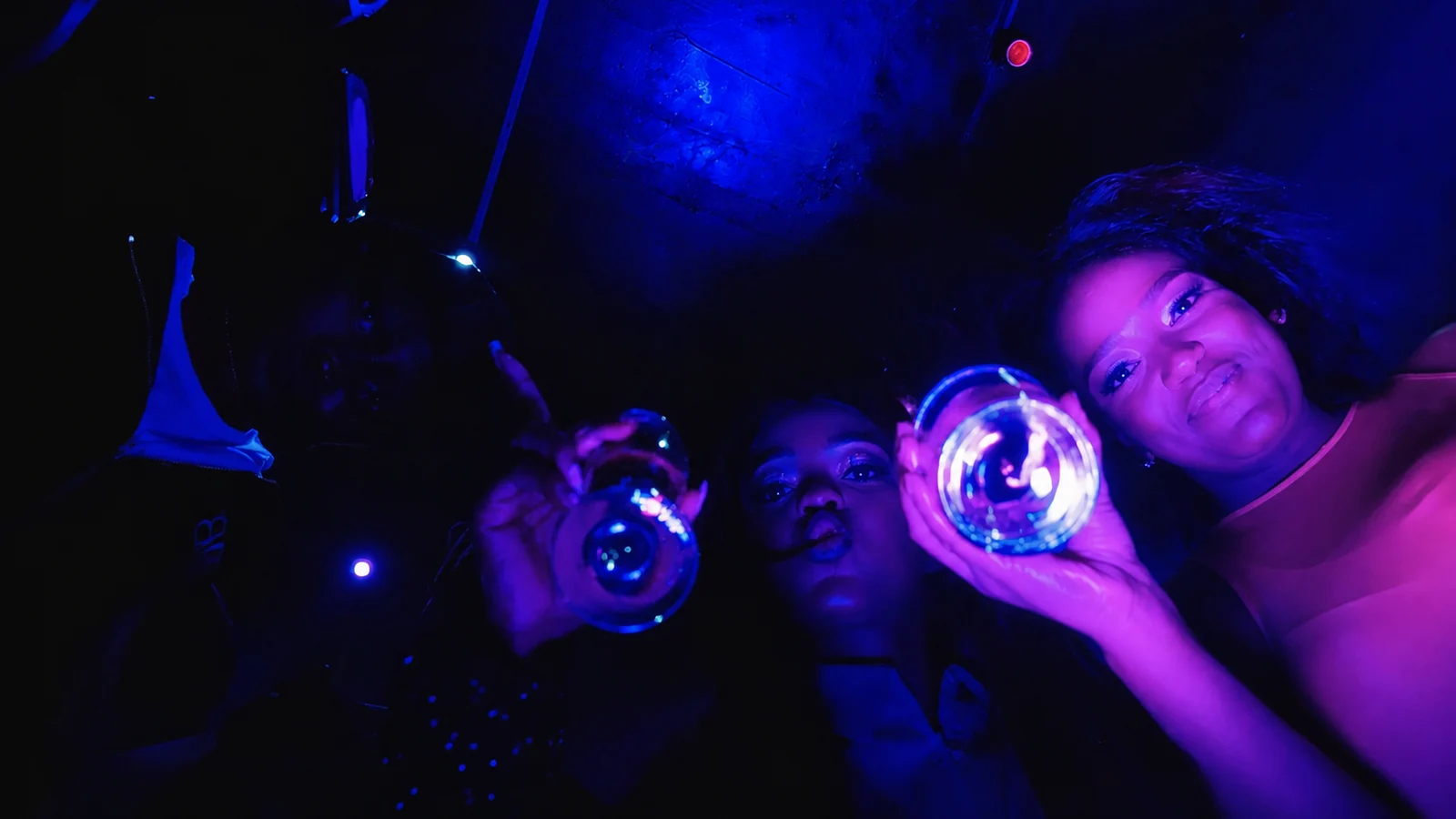 Friends gathering around the camera in Linda-Ray’s Mama music video