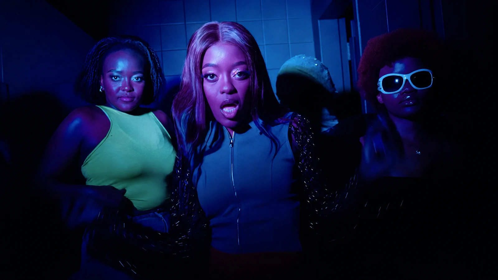 Linda-Ray performing in the Mama music video