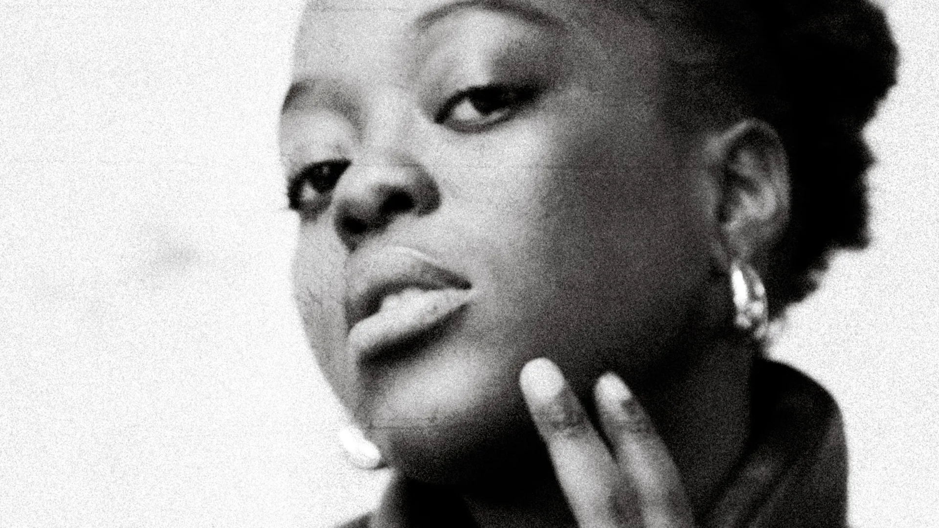 Close-up black-and-white promotional portrait created for The Showcase