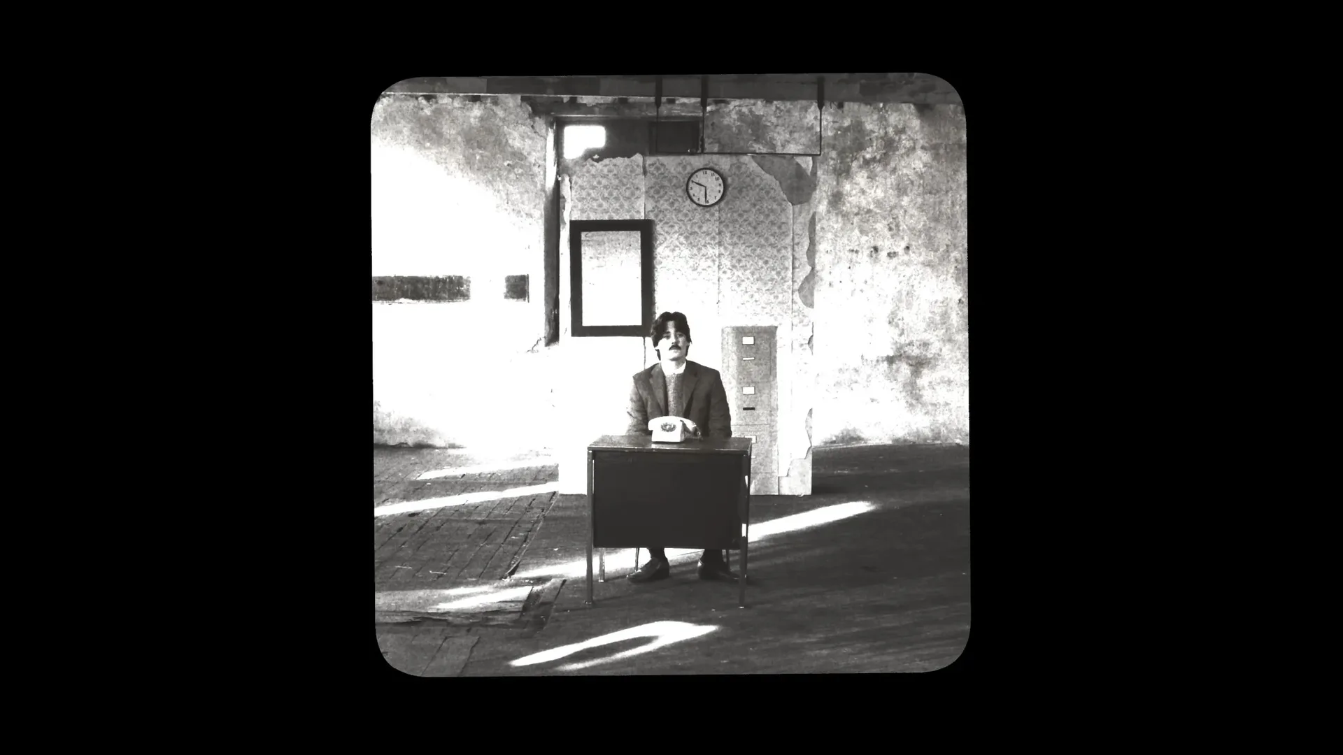 Answer The Telephone black-and-white experiment room still