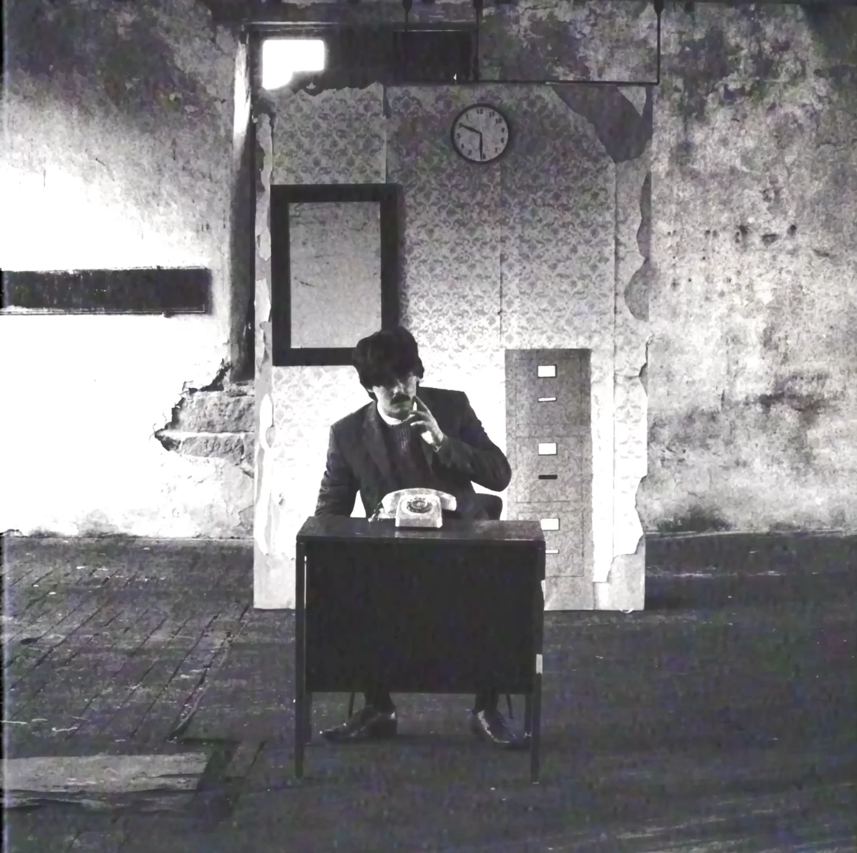 Answer The Telephone v7.1 square film still of Adam at the telephone