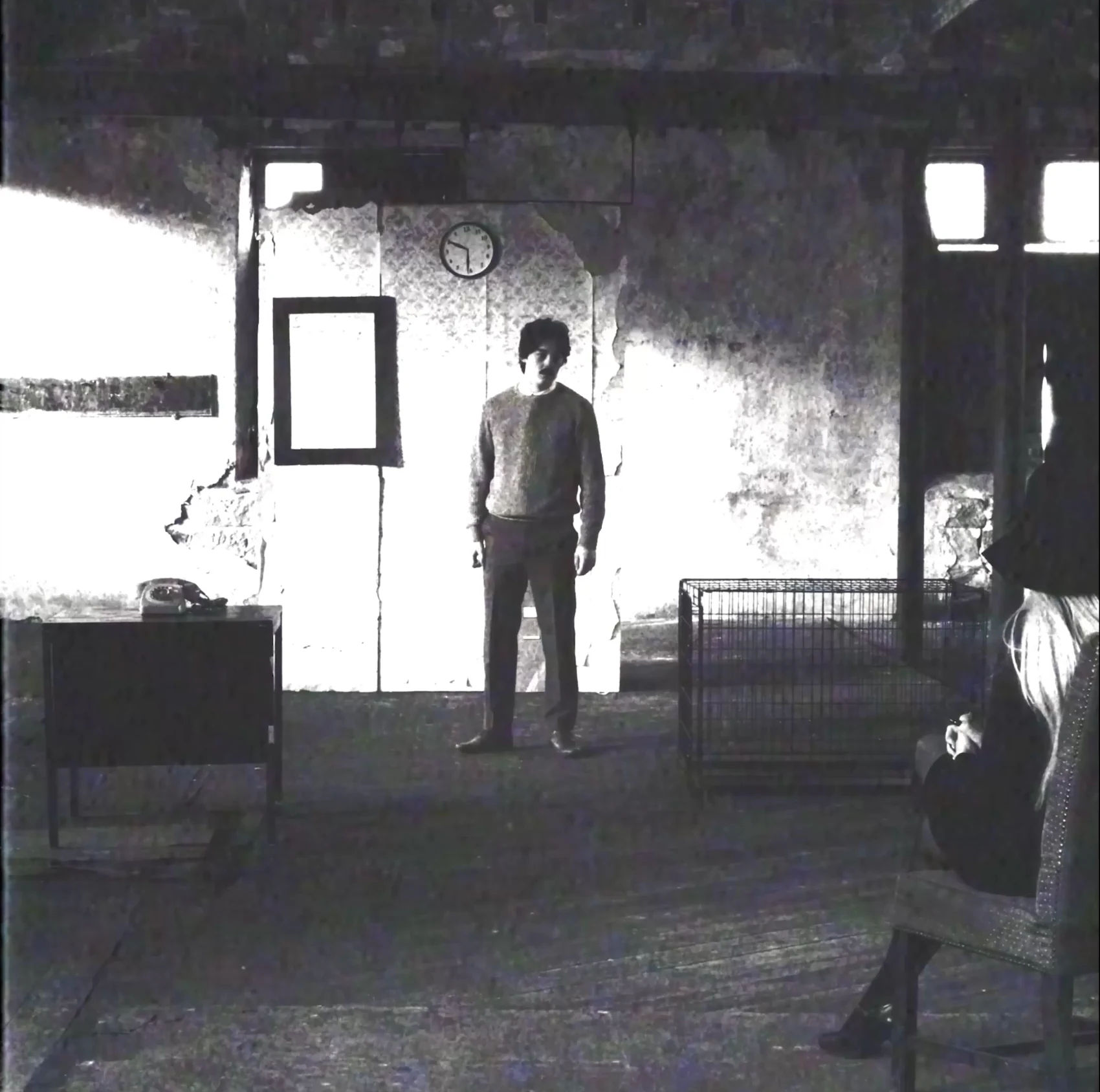 Answer The Telephone v7.1 square still of Adam holding the telephone receiver