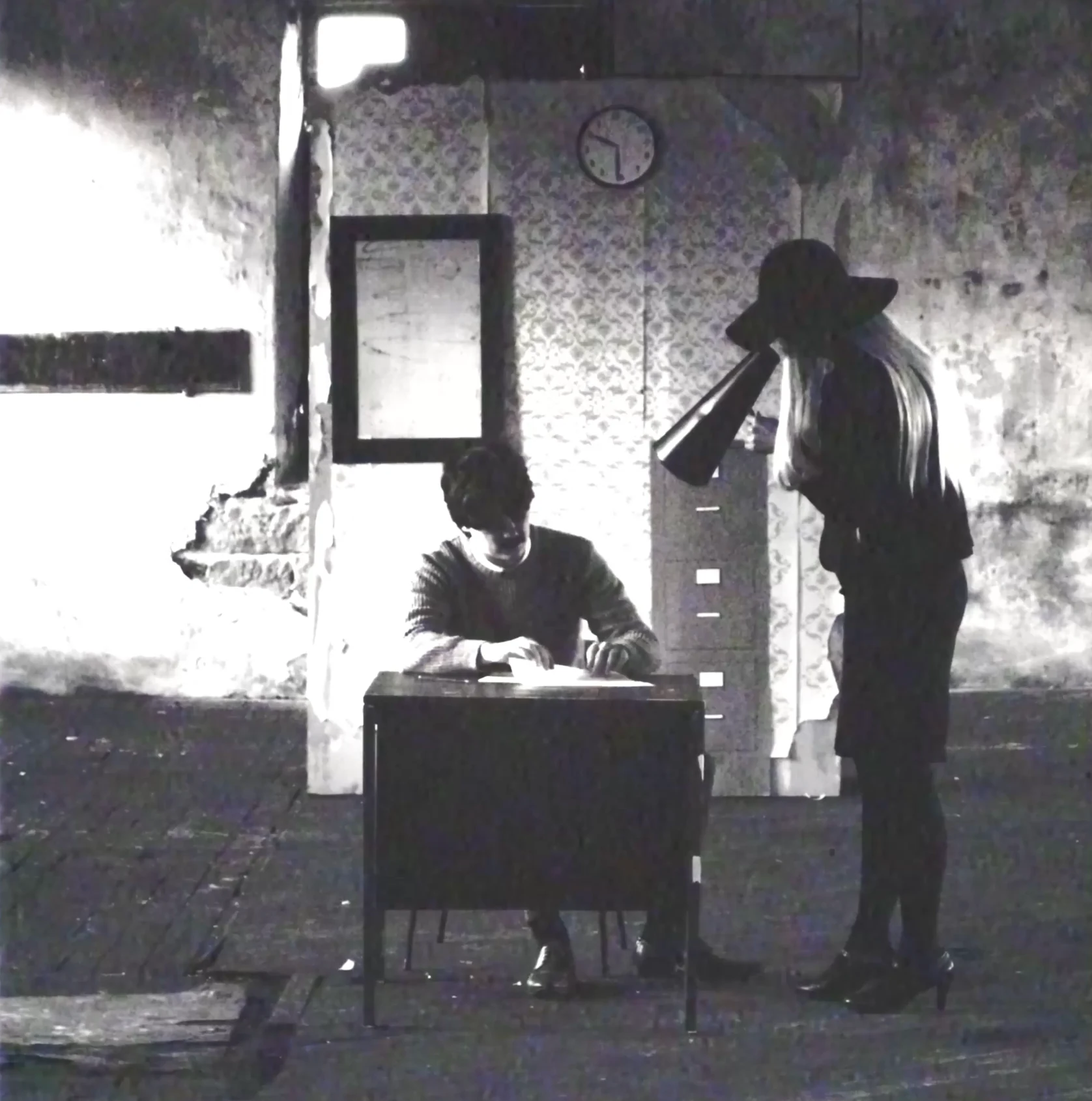 Answer The Telephone v7.1 square still of Adam in the experiment set